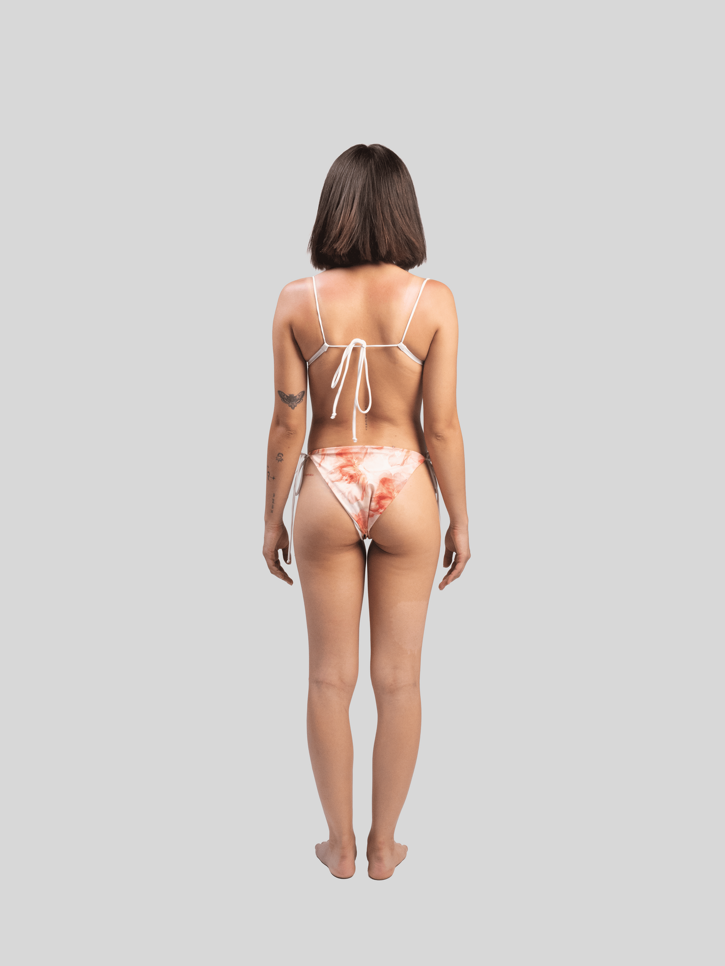 
                  
                    Set 2 pz con tanga reversible Bikini Priscila
                  
                